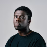 Home african man black tshirt fashion studio posing closeup 163305 195841