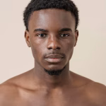 Home portrait young handsome man posing 23 2148884314